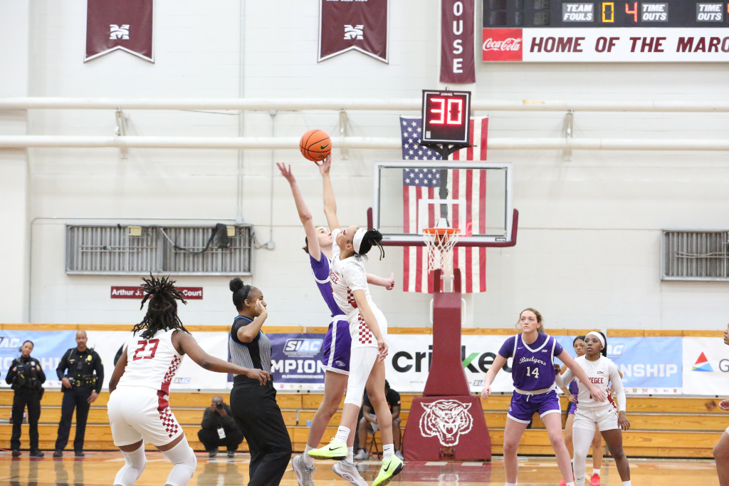 Tuskegee Women's basketball player for for a lay-up.